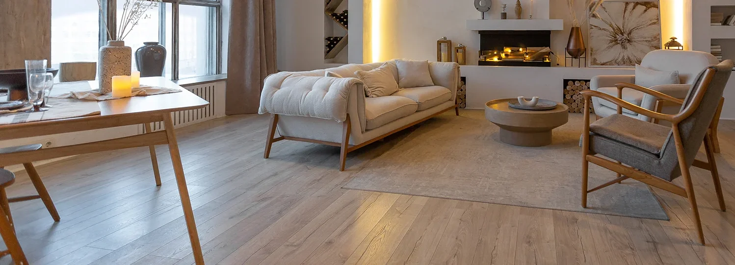 a couch in a room with timber flooring